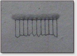 Рис. 4. Перпендикулярный срез боковой стороны девятиполосного магнита с исходящими от них огненными струями.