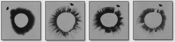 Примеры характерных негативных форм излучений в области глаз на короне среднего пальца руки